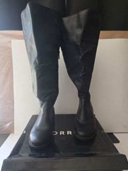 Torrid black Over-The-Knee boots.