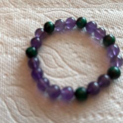Bracelet approximately . 6” Stretchable.