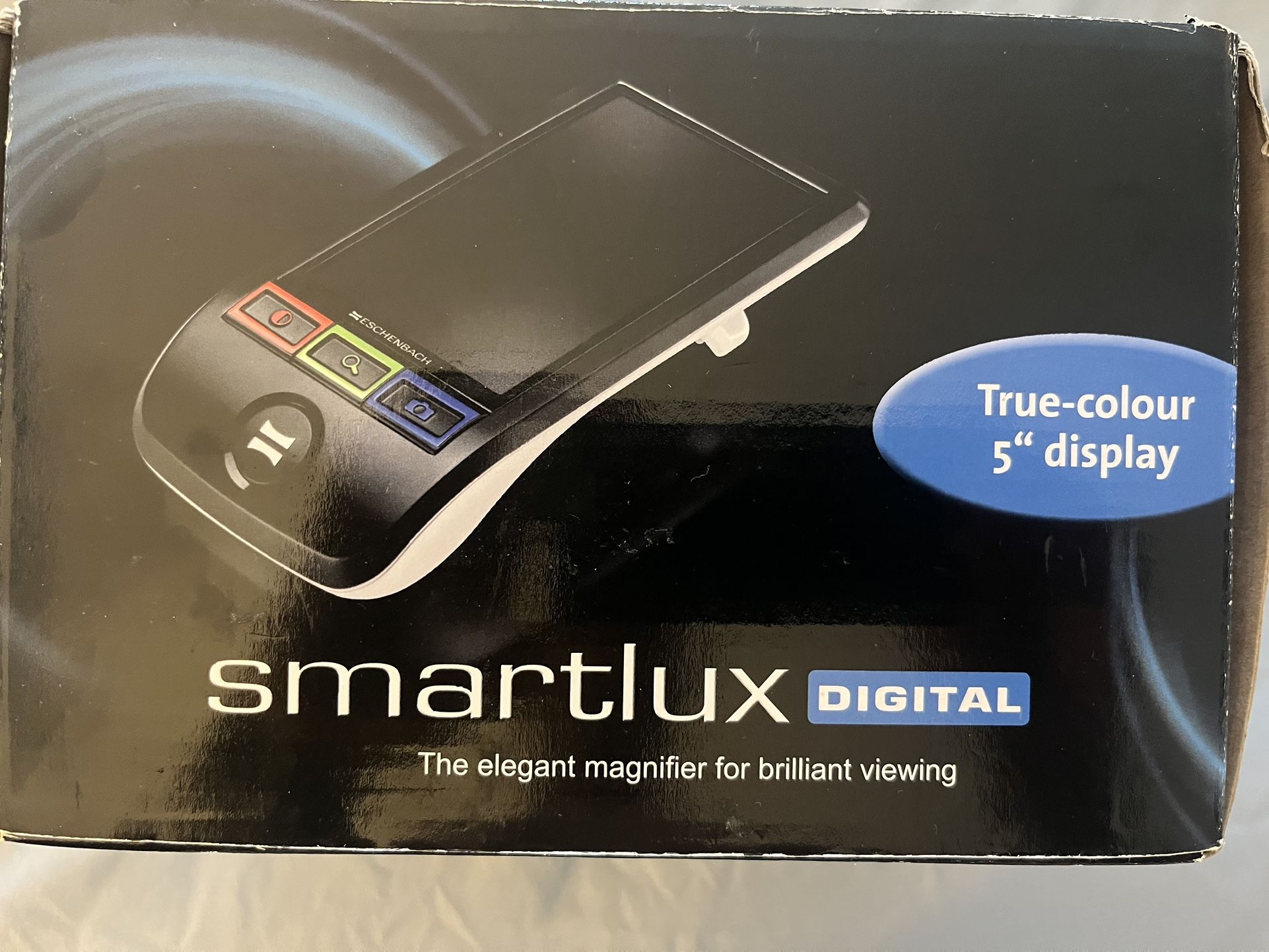 digital magnifier with a sleek black design. Features a true-color 5-inch display for enhanced viewing. This device is wonderful for someone 
