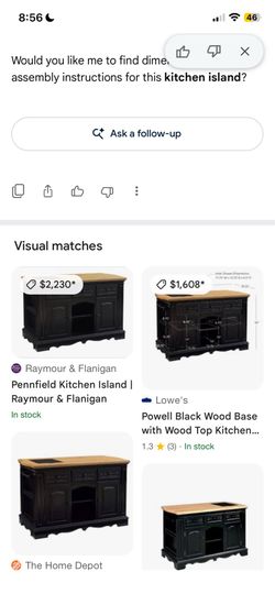 Kitchen island with removable cutting board