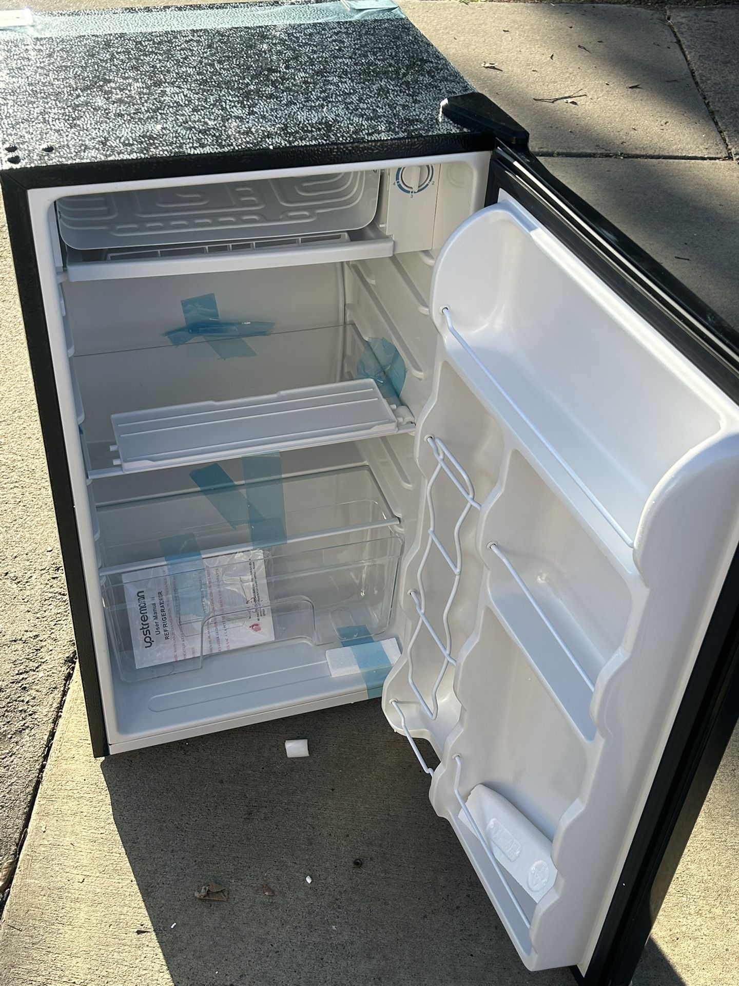 Brand new mini refrigerator with freezer for $100