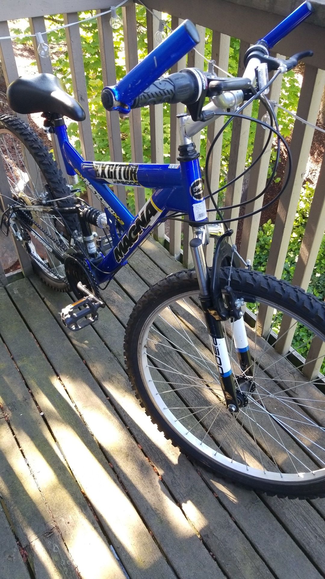 26 inch Wheels 21 Speed Grip Shift 2X Suspension Magna Excitor Mountain Bike