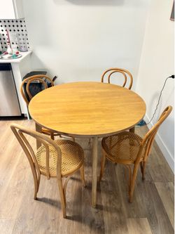 Round table with four chairs
