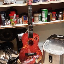 A Little  Kid Cars Disney Guitar