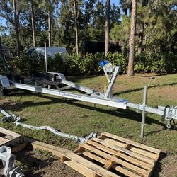 New 2026 Trailer Mania 7K GVWR dual axle boat trailer.  21-23ft model.  Ready to go.