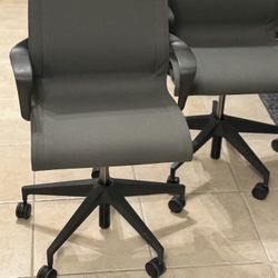 Herman Miller Setu Ergonomic Mesh Gaming Chair • Sleek, flexible support for modern workspaces.