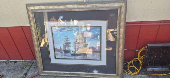 Framed natical Ships on the ocean painting.
