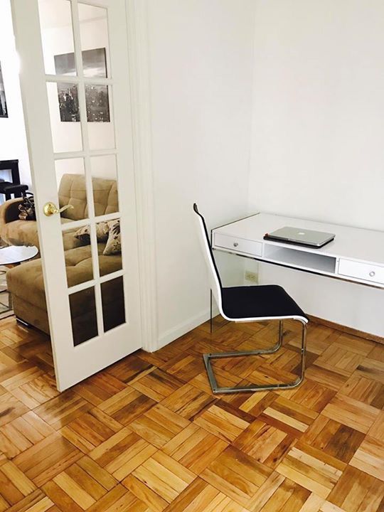 White computer table with glass legs. 42’’ length, 23’’ width. Super Stylish. Looks like brand new. With stylish chair