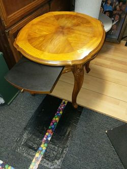 End table with extended leaf.