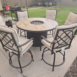 High table with firepit.