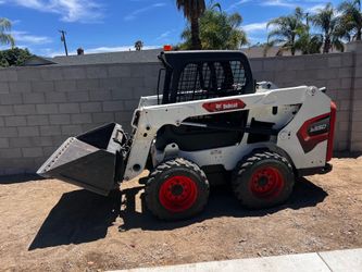 Bobcat tractor skid steer loader Cat