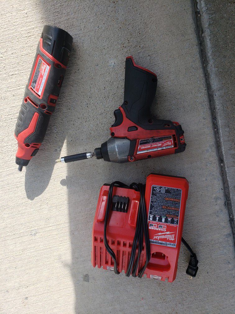 milwaukee power tools impact driver and hand dremel plus battery and charger