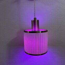 Rechargeable LED wall lamp with remote control, featuring dimmable, romantic LED colored lights and a night light function.