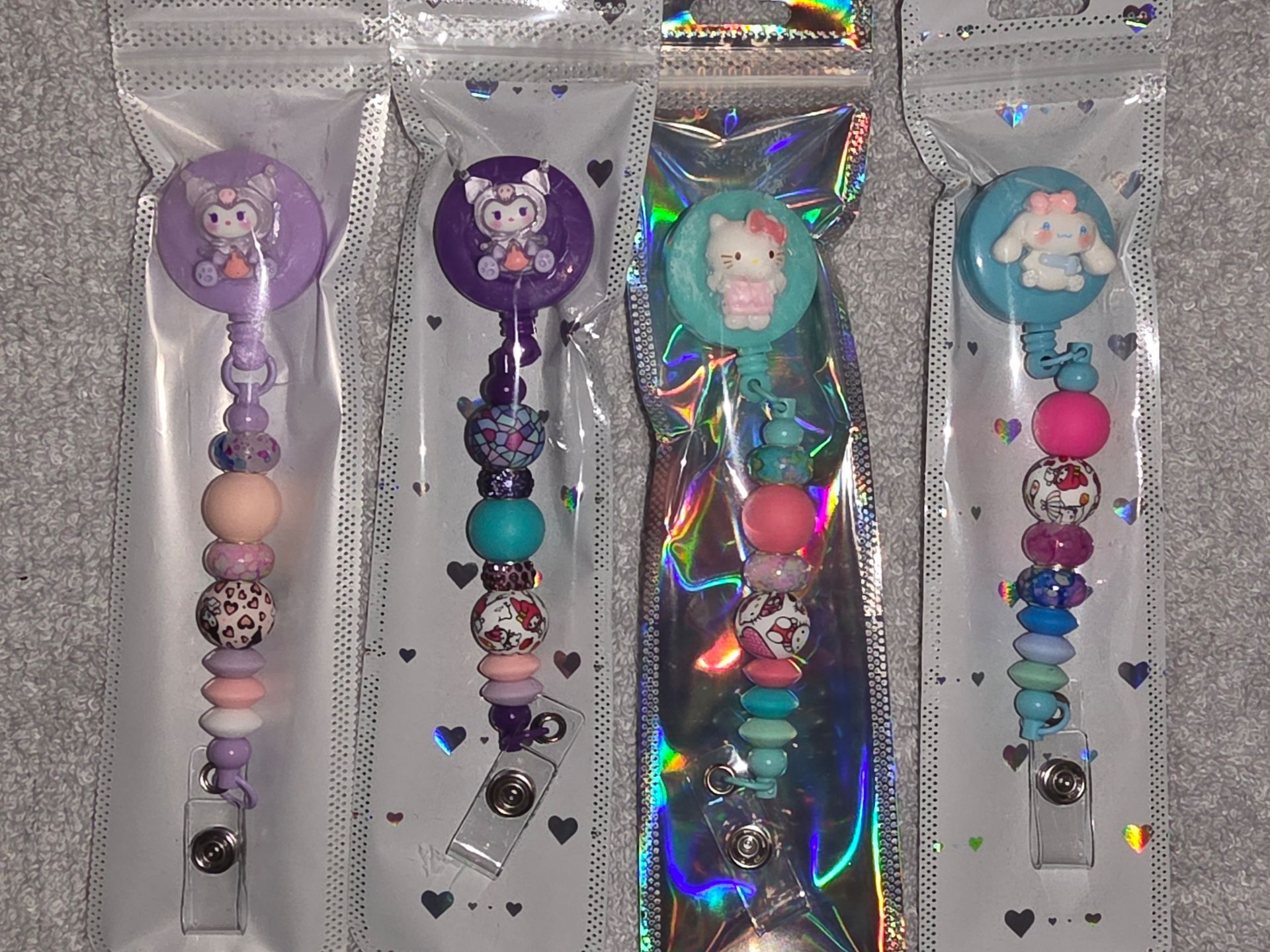 handmade retractable badgeholder, pens and keychains
