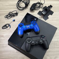 PlayStation 4 (PS4) + 2 Controllers + Dual Charging Dock + Cables – Ready to Play