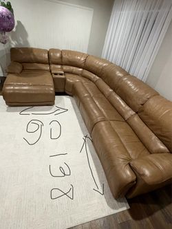 Reclining leather sofa