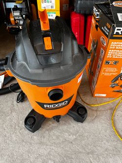 New Powerful RIDGID 12 Gallon Wet/Dry Vac NXT. It has a hose and multiple attachments. Original box included.try before you buy. Pickup only.