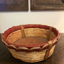 Amish handmade woven basket with red twine and leather accents,