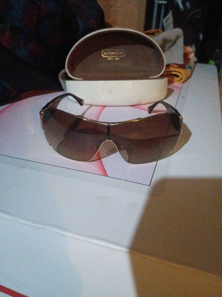 I Have Woman Coach Sunglasses