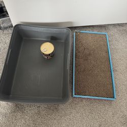 scratching post, litter box, and 2 cans of cat food, all for $10