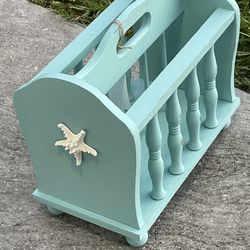 Vintage magazine rack spindle style solid wood freshly painted In Sherwin-Williams