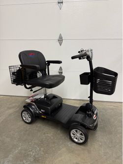 Flynama Four Wheels Compact Travel Mobility Scooter with 300w Motor- Chrome Model #L-P198329  $1655 plus tax at Lowe's website new still in the box
