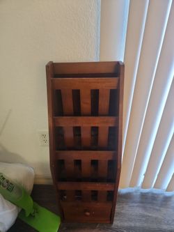Magazine holder/paper holder and or book holder