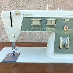 $50. Singer Sewing Machine Model 734 & Table 