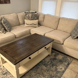 Beige Sectional With Coffee Table And Two End Tables 