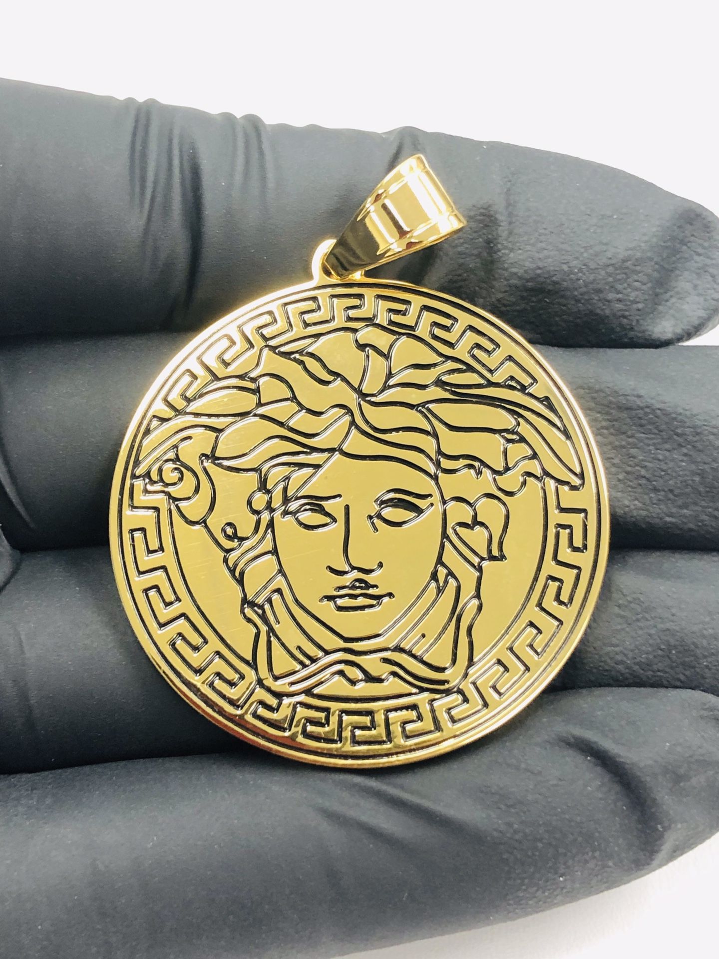 Brand new 14k gold finish Medusa head pendant with stainless steel