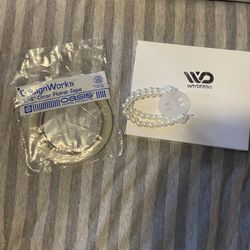 3 Corsage wristlets and Clear floral tape