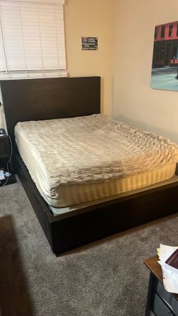 3 year old wooden bed frame from Living Spaces