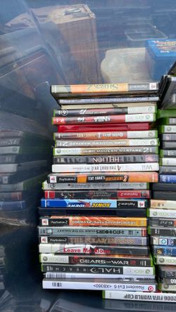 Old video games about 50 or 60 PlayStation two Xbox 360 a few DVDs