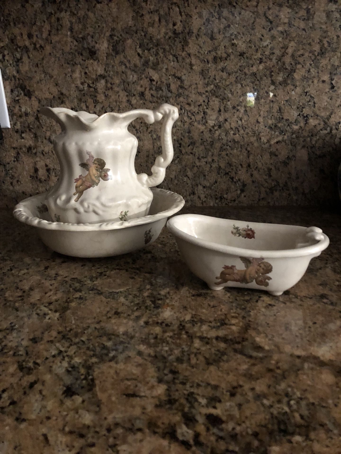 Antique ceramic angel pitcher, bowl, and soap tub