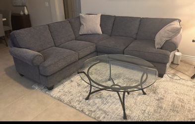 Sectional and glass table for sale.