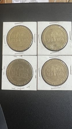 Four tokens 1997 $1 New York New York Hotel Casino Vintage Slot Token Old Gambling Dollars all them for $40