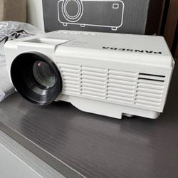 New Projector - Projects Up to 200" 