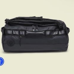 BRAND NEW Baboon to the Moon Go-Bag Small Backpack in Black - 40L - NEW