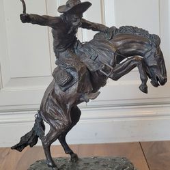 Frederick Remington bronze statue. " Bronco Buster"