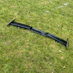 Rear spoiler for a car