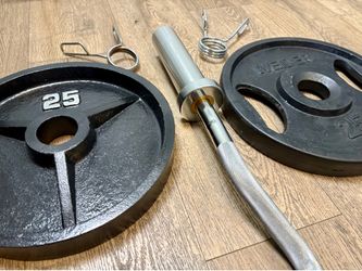 Brand NEW Olympic  Curl Bard (in cardboard tune) with cooper bearings mechanism & Cast Iron Weight Plates 25s, 10s and 5s . Total: 100 lbs