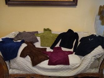 Small sweaters and one medium sweater
