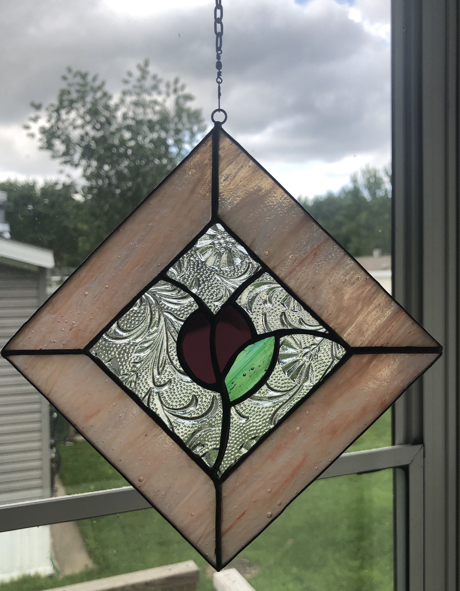 Beautiful vintage stained glass decor with long chain in great condition!