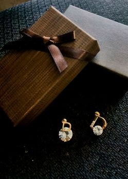 $10 Ladies gold stud earrings feature an asymmetric design with a classic fashion pattern