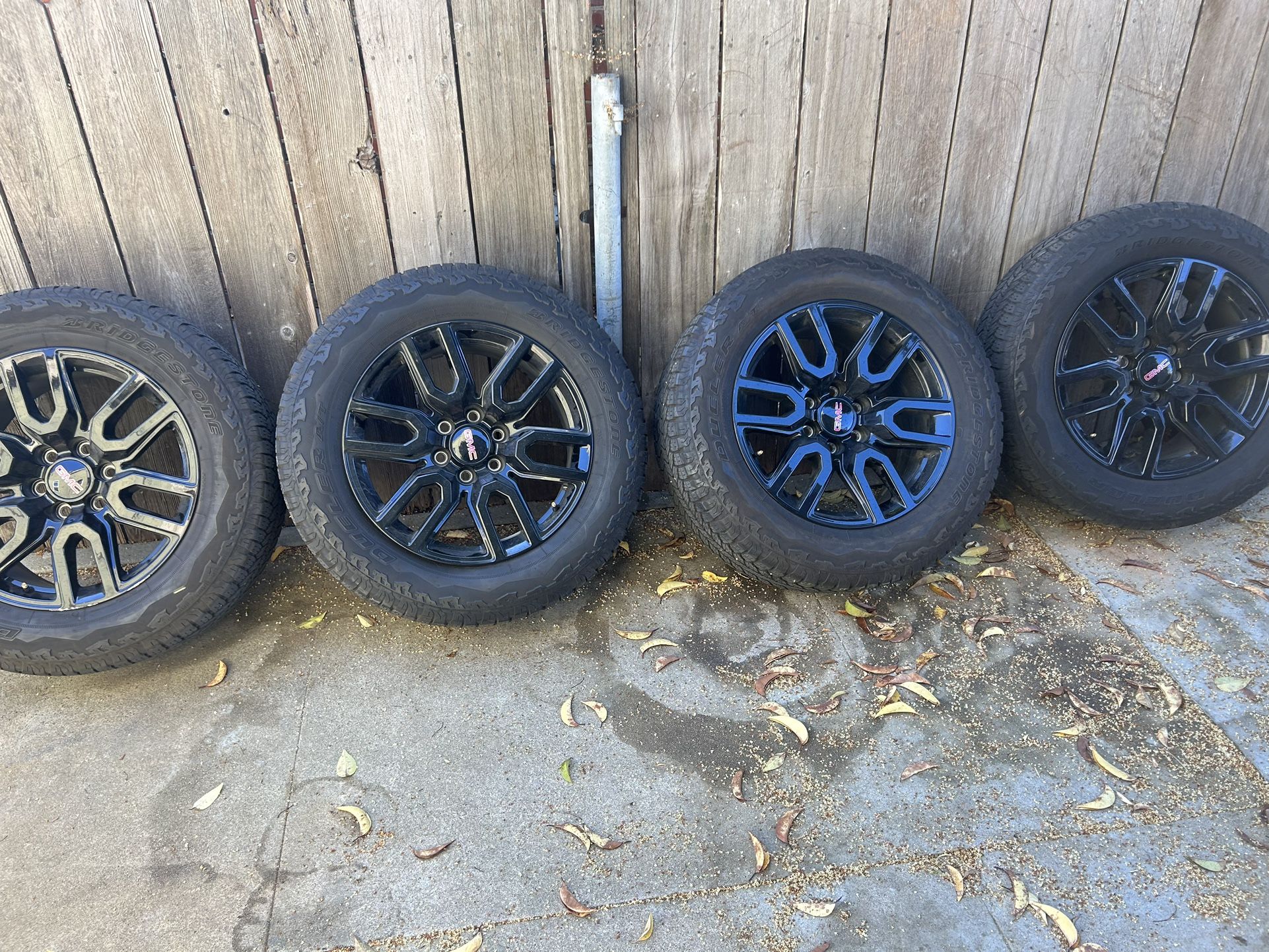 Like New GMC Black Rims And Tires