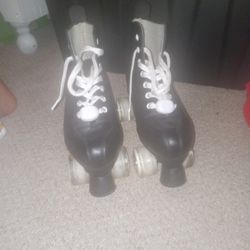 Black roller skates size 9 