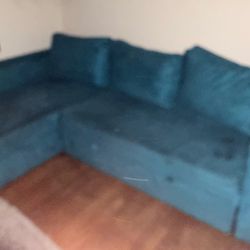 Teal sectional clutch