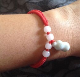 Auth jade bracelet with peanut pendant