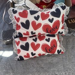 2 almuadas nuevas bonitas d corazones