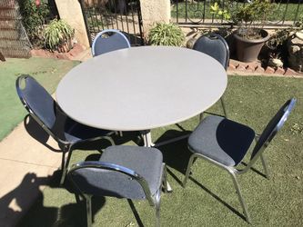 5 Stacking chairs and table